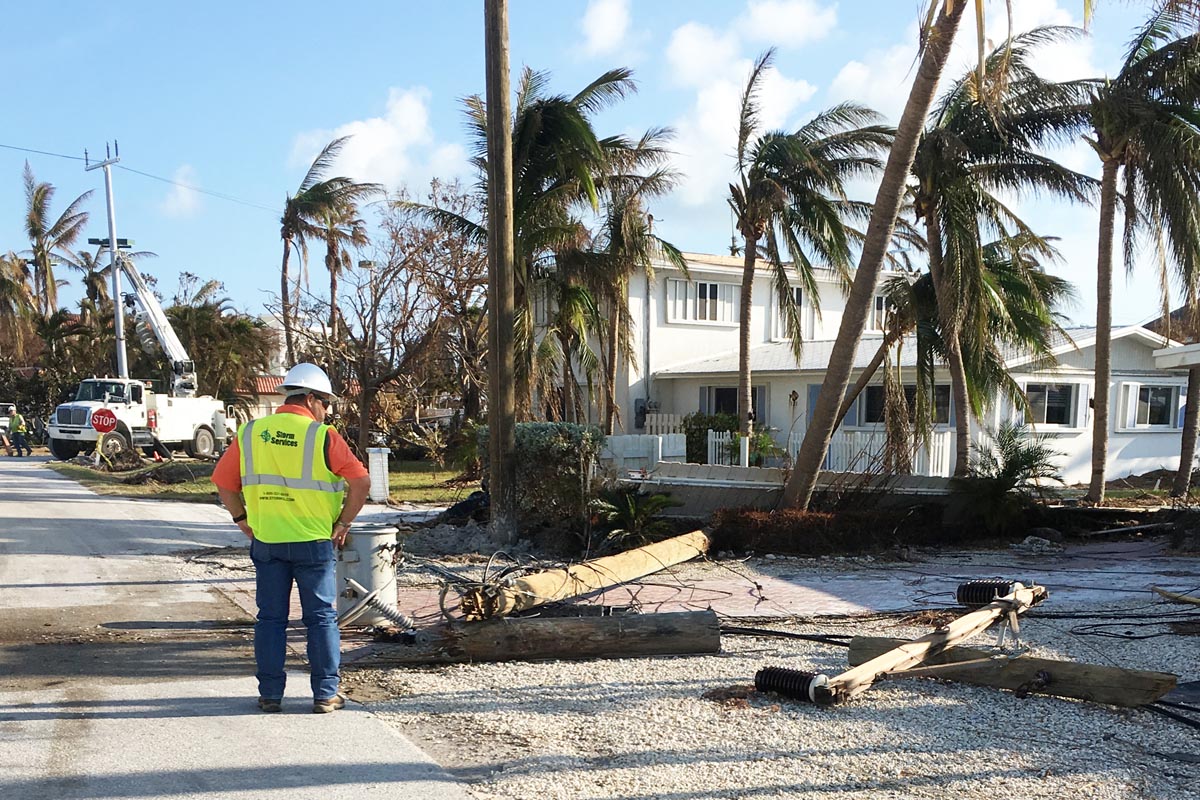 Damage assessor overlooks hurricane damage.